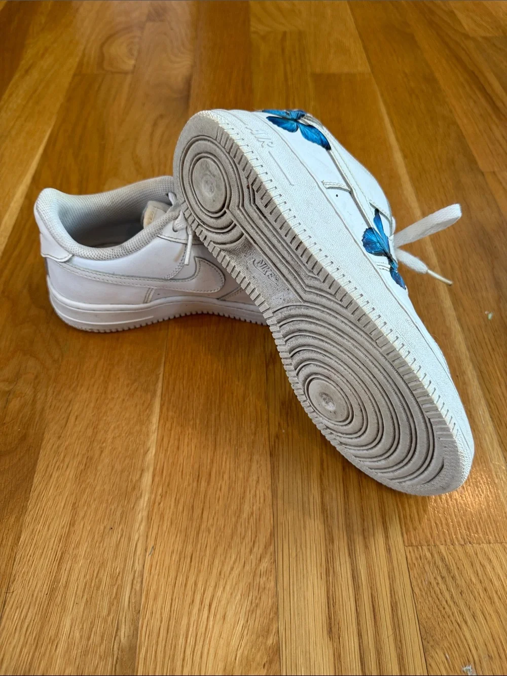 Nike Air Force One Sneakers with Blue Butterfly Accents